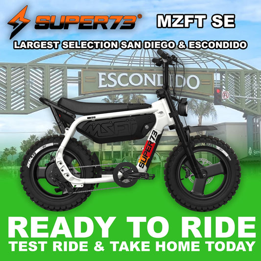 Super73 MZFT SE eMOTO eBike in Baja color, side view, ready to ride, displayed on a plain background