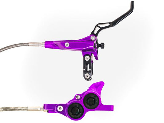 Purple Stomp Ebox Megalith Performance Brake Kit, including brake calipers, rotors, and hardware, displayed on a white background