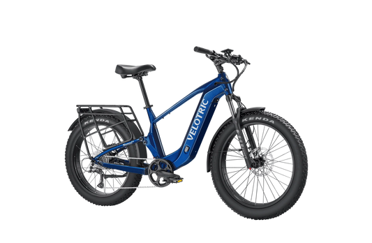 Royal blue Velotric Nomad 2X High Step eBike, side view, showcasing frame design and features