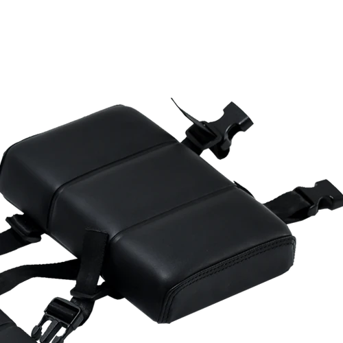 Revi Passenger Seat Pad in black, shown from a side angle highlighting its contoured shape and textured surface.
