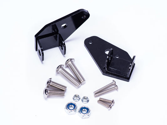 Stomp Ebox Dragster foot peg mount, black metal bracket with mounting holes, shown on a white background.