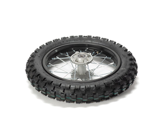12-inch Stomp Ebox rear wheel, side view, showing black rim, silver spokes, and knobby off-road tire