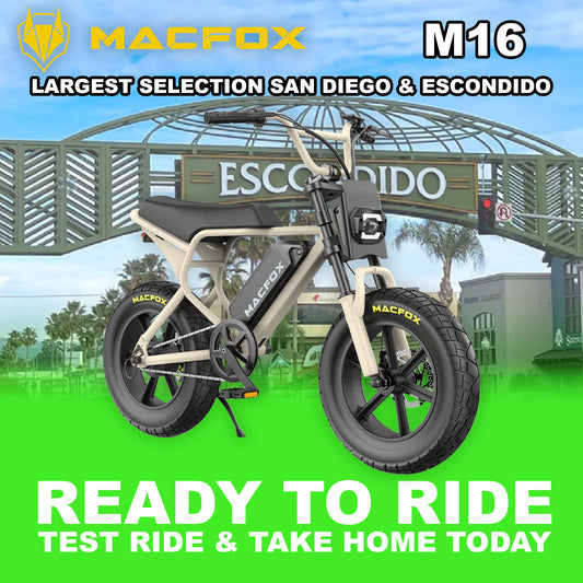 Macfox M16 eBike in desert beige color, displayed outdoors in Escondido with rugged terrain in the background.