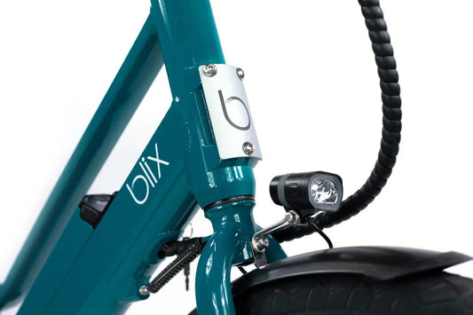 Blix Packa Genie Step-Thru electric cargo eBike, 750W motor, shown with cargo rack and step-through frame, side view, white background.