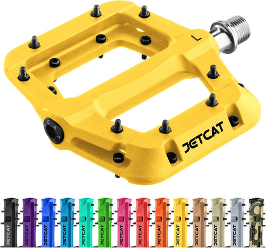 Yellow JetCat eBike pedals with a sleek design, shown against a plain background.