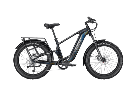 Obsidian black Velotric Nomad 2X High Step eBike, side view, showcasing sturdy frame and large tires