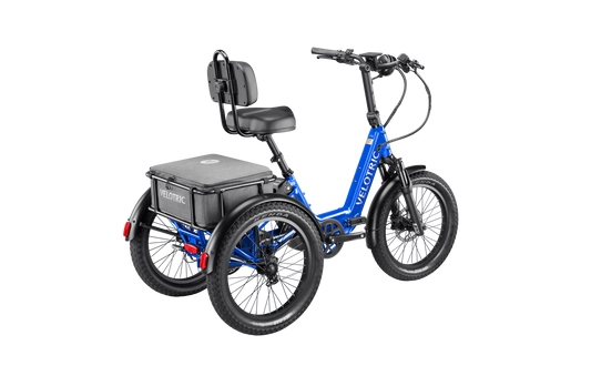 Electric blue Velotric Triker eTrike, side view, three wheels, modern design, displayed on a white background