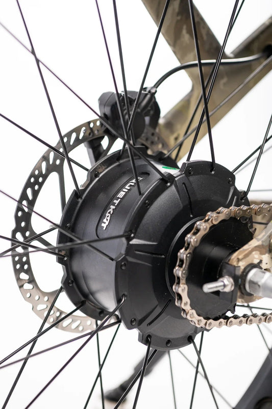 QuietKat Ranger AWD 750W step-over electric mountain bike with 26x4.5 inch fat tires, shown from a side angle against a white background.