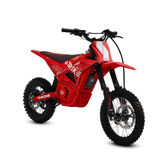 Red eMOTO Strike Shadow electric motorcycle, side view, parked on pavement with urban background