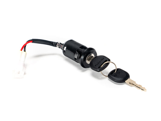 Stomp Ebox EBX ignition barrel and key set, showing the ignition barrel with attached wiring and a matching key placed beside it on a white background.