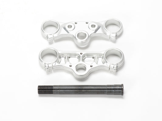 Stomp Ebox triple clamps with steerer, front view showing black anodized finish and precision-machined aluminum construction.