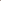 A group of people collaborating around a table with laptops and documents, engaged in a team discussion in a modern office setting.